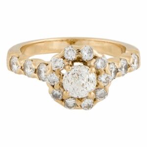 Gold Ring with Diamond Centerpiece and Delicate Band